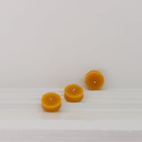 100% Beeswax individual Tealight candles without tin. Burn-time of up to 3.5 hours and available in 6 and 10 packs.