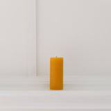 The Timeless Collection beeswax pillar-Small. Burn-time of up to 13 hours. 3.5cm wide, 9cm high, weighs 70g. All measurements are done at the minimum.